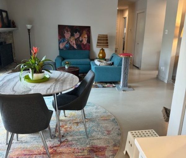 living room with modern concrete floors.